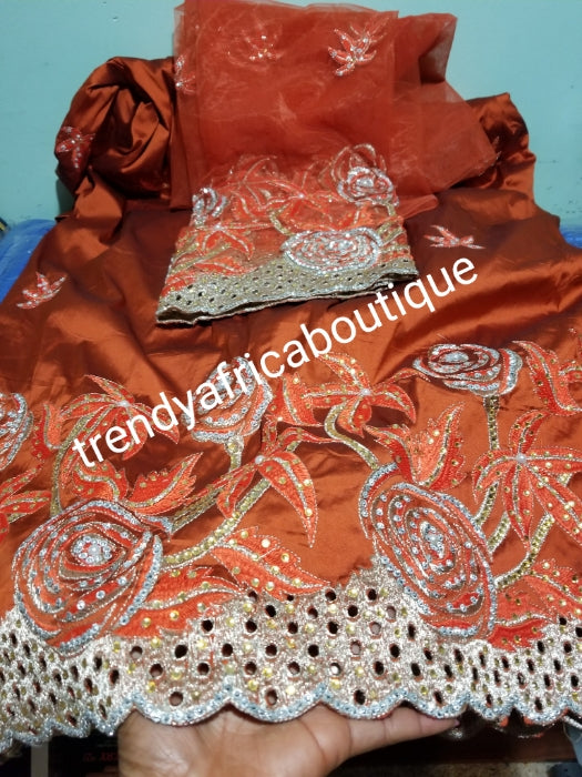 Nigerian Tranditional George wrapper. Embriodery/stones design in Burnt Orange and a matching net for blouse. Small-George. Superior quality African embroidery George.  Feel the differencein quality.