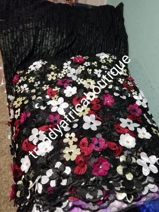 Special offer french lace fabric. Beautiful 3D flower border made to perfection. Ideal for evening gown, or Nigerian traditional wedding outfit. This color is Black with mix flower petals. Sold per 5yds. Nigerian celebrant lace