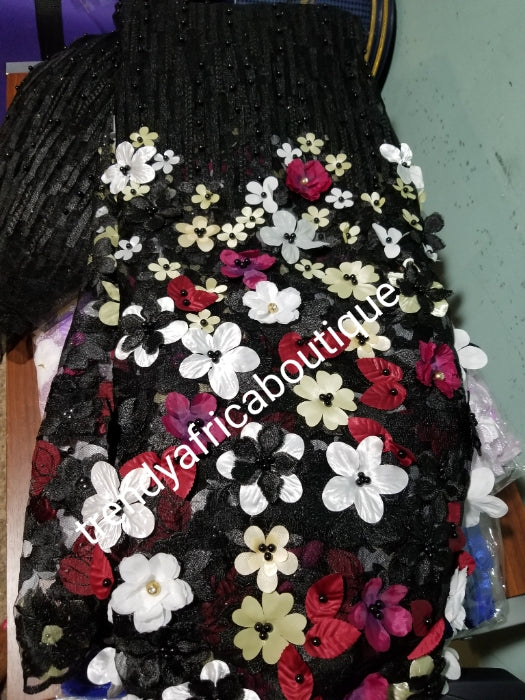 Special offer french lace fabric. Beautiful 3D flower border made to perfection. Ideal for evening gown, or Nigerian traditional wedding outfit. This color is Black with mix flower petals. Sold per 5yds. Nigerian celebrant lace