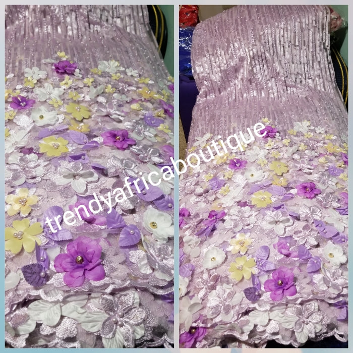 New arrival french lace fabric. Beautiful 3D flower border made to perfection. Ideal for evening gown, or Nigerian traditional wedding outfit. This color is lilac with purple multi color petals. Sold per 5yds