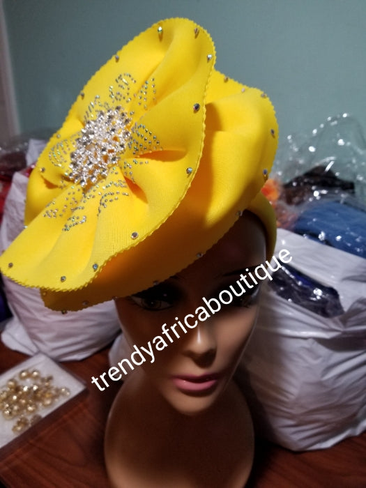 Yellow color Women-turban. One size fit all turban. Beautiful flower design with a side brooch to add decor to your head wrap accessories. Head wrap made ready
