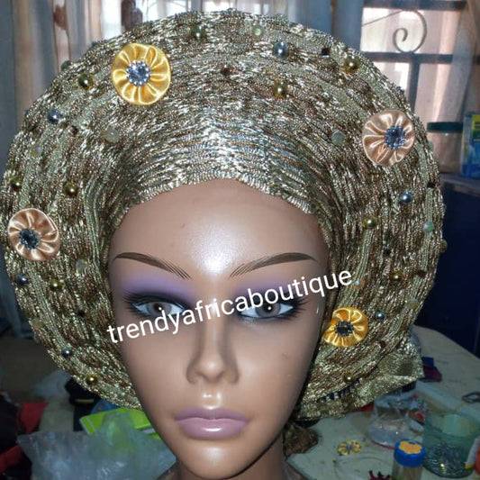 New arrival of Champagne gold auto-gele made with basket aso-oke/original quality Nigeria aso-oke woven.  Auto-gele Party ready in less than 5 minutes. One size fit, easy adjustment at the back