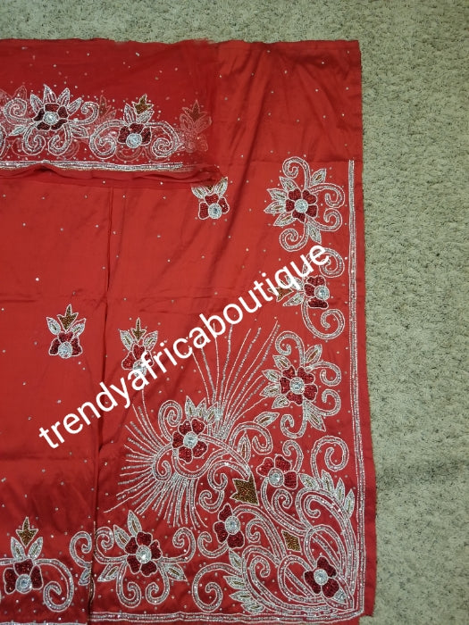 quality Red Nigerian Traditional silk George wrapper. Beaded and stoned in Red color. 2.5yds + 2.5yds and a net fabric for Blouse combinations. Sold as a set. This is special offer george