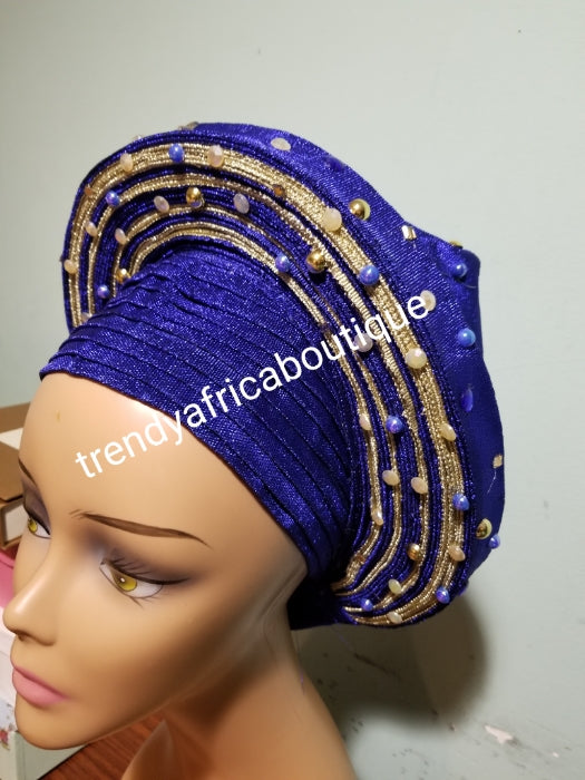 Clearance Nigeria gele. Royal blue/champagne Auto-gele. Nigerian aso-oke made into auto gele. Two tone auto gele beaded and stoned. Party ready in less than 5 minutes. One size fit, easy adjustment at the back