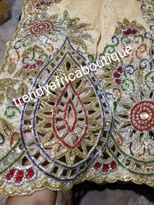GOLD VIP Celebrant Nigerian women George wrapper. Stoned to perfection with multi-color stones. Hand cut border. Niger/Igbo/delta traditional wedding George hand beaded and stoned for special occasion. 2.5yds + 2.5yds + 1.8yds net blouse.