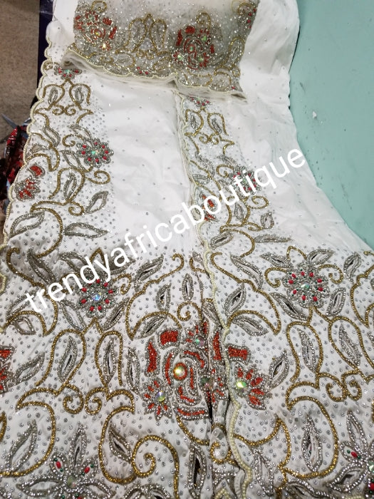 Pure White VIP Celebrant silk George wrapper. Stoned to perfection with Red/multi-color stones. Hand cut border. Niger/Igbo/delta traditional wedding hand made George  for special occasion. 2.5yds + 2.5yds + 1.8yds net blouse