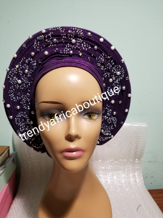 Sweet Purple Auto-gele made with quality Aso-oke. Silver stoned work to perfection. One size fit, easy to adjust for fit and knot at the back to secure your gele. This is true original auto gele