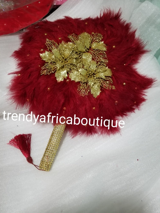 Wine/Gold color, Nigerian hand made Feather hand fan. Custom made, front design with gold handle and tassel. medium size hand fan Nigerian Bridal-accessories design with beads and flower petal.