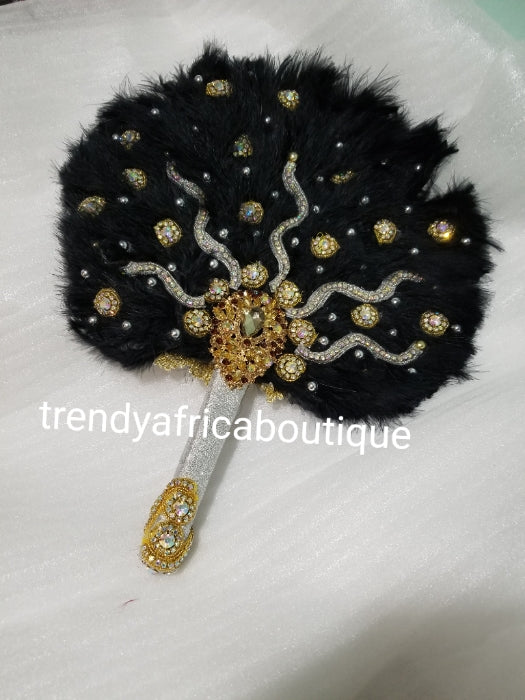 Black/Gold color, Nigerian hand made Feather hand fan. Custom made, front design beaded and stoned. Small size hand fan Nigerian Bridal-accessories design with beads and flower petal.