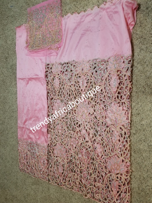 Ready to ship, Nigerian VIP traditional wedding/ceremonia George wrapper and matching net for blouse(now sewn). Sweet pink color, top wrapper is all over hand cut, beaded and stoned to perfection. Super quality silk George for igbo/delta weddings