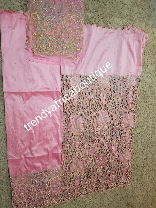 Ready to ship, Nigerian VIP traditional wedding/ceremonia George wrapper and matching net for blouse(now sewn). Sweet pink color, top wrapper is all over hand cut, beaded and stoned to perfection. Super quality silk George for igbo/delta weddings