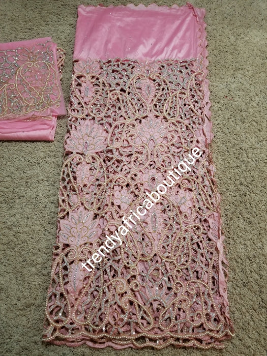 Ready to ship, Nigerian VIP traditional wedding/ceremonia George wrapper and matching net for blouse(now sewn). Sweet pink color, top wrapper is all over hand cut, beaded and stoned to perfection. Super quality silk George for igbo/delta weddings