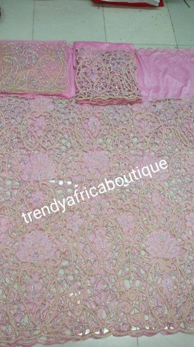 Ready to ship, Nigerian VIP traditional wedding/ceremonia George wrapper and matching net for blouse(now sewn). Sweet pink color, top wrapper is all over hand cut, beaded and stoned to perfection. Super quality silk George for igbo/delta weddings