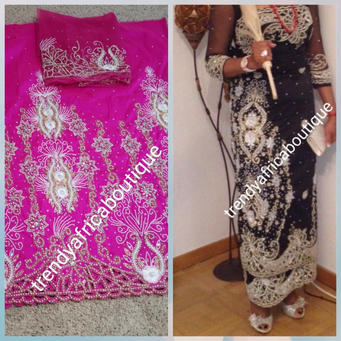 Ready to ship: Exclusive fuchsia pink Madam/celebrant Nigerian George wrapper. Beaded and stoned with hand cut border. Special occasion wrapper. 5yds + 1.8yds matching net (now sewn) for blouse. Tradtional Igbo/Delta Bridal outfit