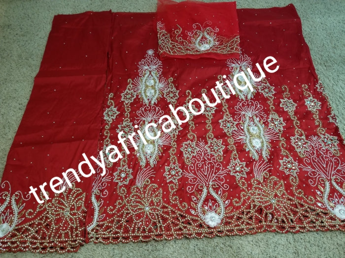 Ready to ship: Exclusive tomato Red Madam/celebrant Nigerian George wrapper. Beaded and stoned with hand cut border. Special occasion wrapper. 5yds + 1.8yds matching net (now sewn) for blouse. Tradtional Igbo/Delta Bridal outfit