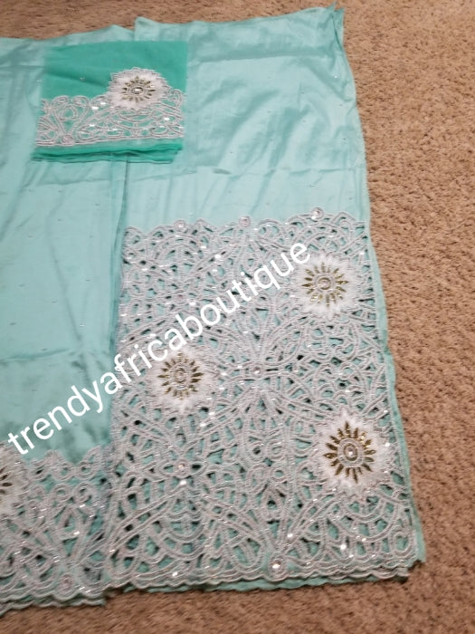 Ready to ship:  Big VIP Nigerian Celebrant Silk George wrapper. All over white crystal stones/beads in hand cut flower design on water Green silk George. 2 wrapper (2.5yd each) + 1.8yds net blouse. Igbo bride