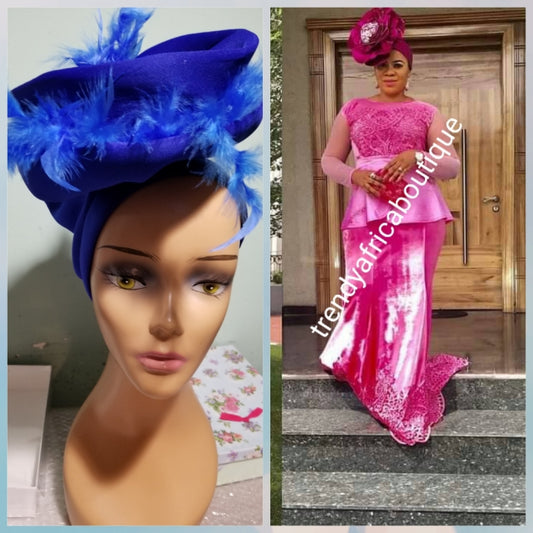 Royal blue color Women-turban. One size fit all turban. Beautiful feather design with a side brooch to add decor to your turban