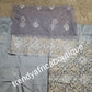 Latest ash/gray  VIP hand cut embriodery Silk George wrapper and matching net blouse. Gray George, All Crystal stones to perfection. Quality Guaranteed. 2 wrapper of 2.5yds each and 1.8yds blouse. Nigerian madam George/Igbo Delta women