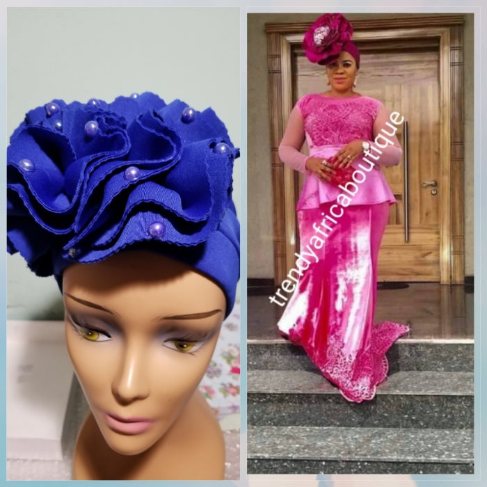 Royal blue color Women-turban. One size fit all turban. Beautiful flower design with a side brooch/beaded and stoned to add decor to your turban
