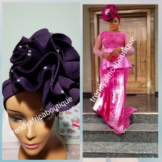 Egg plant color Women-turban. One size fit all turban. Beautiful flower design with a side brooch/beaded and stoned to add decor to your turban