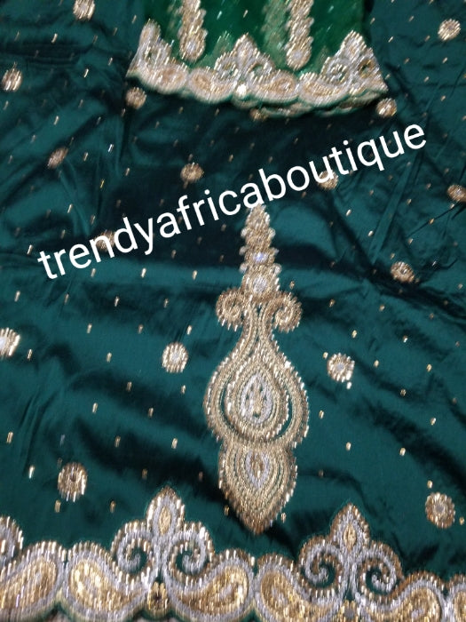 SALE,SALE- New arrival Nigerian Tranditional wedding George wrapper. Embellished with quality dazzling beads/crystal stones design in rich Green. Full 5yds + 1.8yds matching blouse + free headtie. Indian-George.