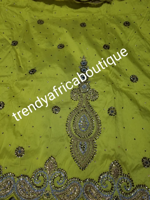 SALE,SALE- New arrival Nigerian Tranditional wedding George wrapper. Embellished with quality dazzling beads/crystal stones design in rich yellow. Full 5yds + 1.8yds matching blouse. Indian-George.