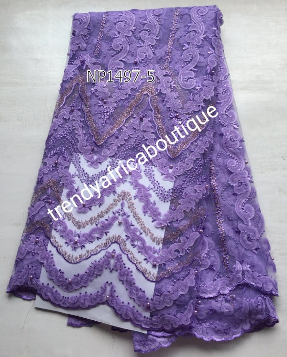 New Arrival of African French Lace fabric. Sweet lilac color. Stoned/Sequence French lace. Great Quality