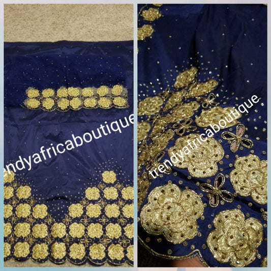 New arrival Navy/gold  quality Silk George wrapper. Gold embriodery + all over crystal stone work. Classic design Niger/delta/igbo George design for Nigerian wedding and more. 5yds + 1.8yrds matching Blouse. Indian-george