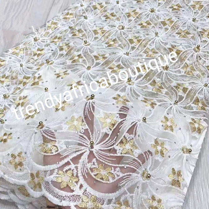 Latest design: African French lace fabric embellished with beads & stones all over to perfection. Sold per 5yds. Nigerian Bridal lace fabric white/gold