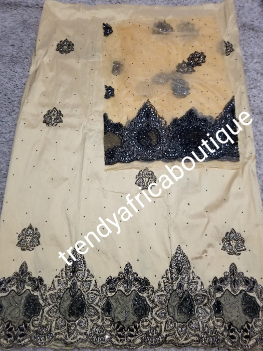 Gold/black mix all over crystal stones, organza border design. Nigerian VIP hand stoned silk George wrapper. 5yrd + 1.8yrds matching net blouse. Igbo/Nigerian Wrapper. For wrapper or skirt/blouse. Excellent lustrous quality