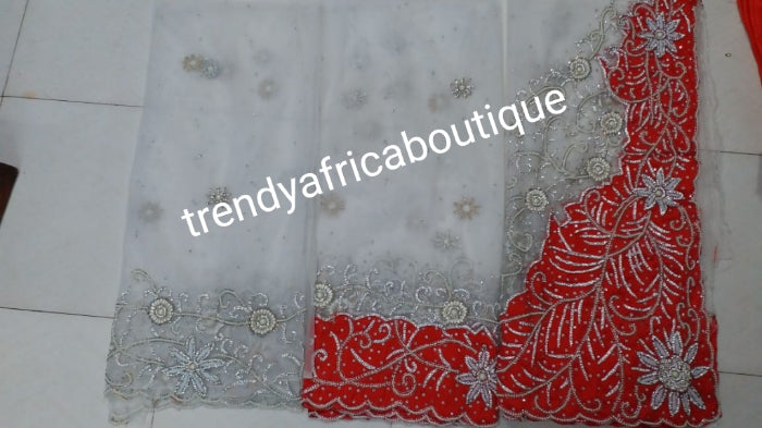 Latest Design: ready to ship White beaded and hand stoned Net/Red taffeta combo on border and side. Gorgeous Igbo Traditional Bridal outfit- quality hand work to perfection. George wrapper and matchimg net blouse. 6.8yds total