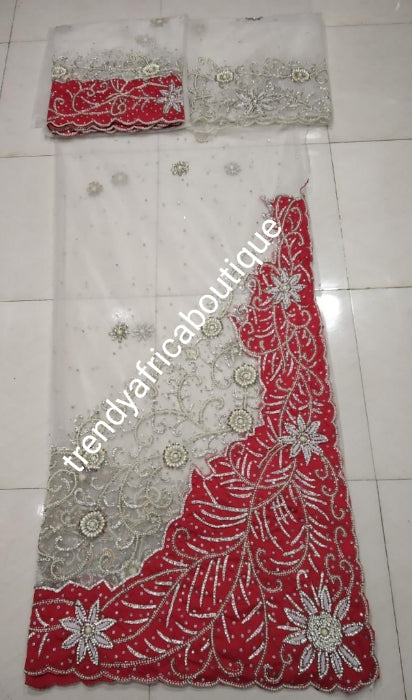 Latest Design: ready to ship White beaded and hand stoned Net/Red taffeta combo on border and side. Gorgeous Igbo Traditional Bridal outfit- quality hand work to perfection. George wrapper and matchimg net blouse. 6.8yds total