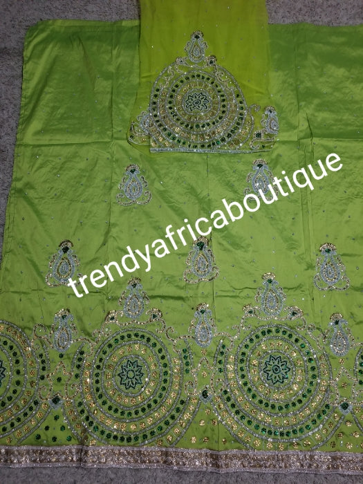 Ready to ship. Lemon green Royal wedding/Celebrants hand beaded and dazzling Crystal stones George wrapper.  Fully hand stone work design to perfection. 2.5yds+2.5yds and1.8 yds matching net for blouse.  Blouse is not made!!!.