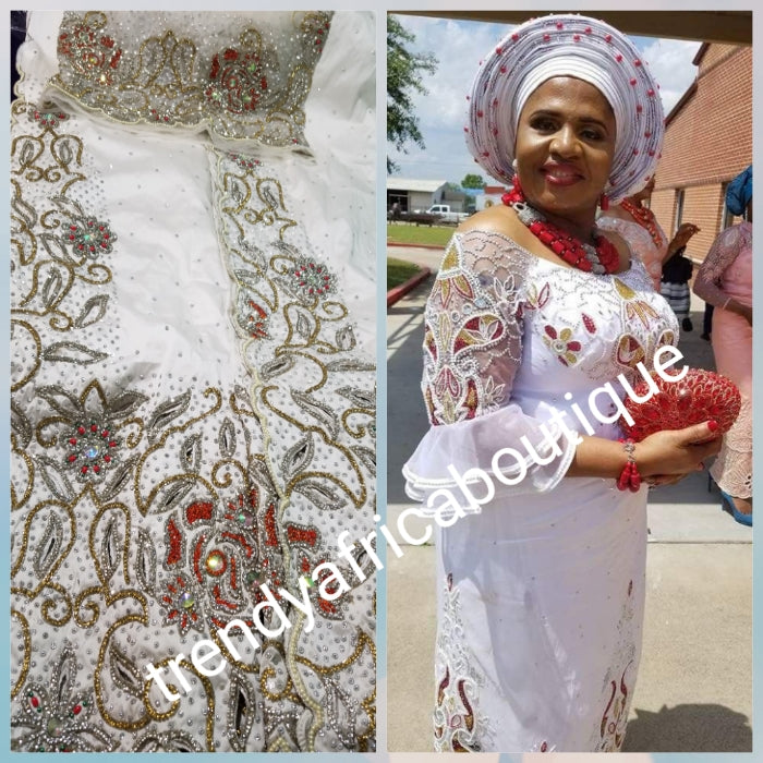 Pure White VIP Celebrant silk George wrapper. Stoned to perfection with Red/multi-color stones. Hand cut border. Niger/Igbo/delta traditional wedding hand made George  for special occasion. 2.5yds + 2.5yds + 1.8yds net blouse