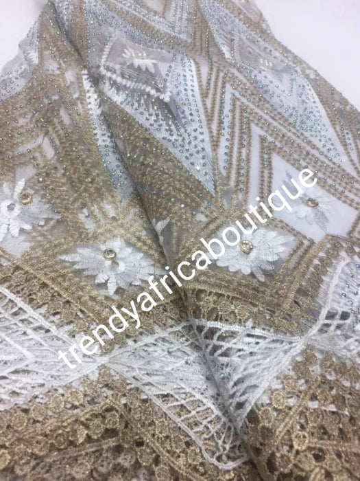 Latest design: African French lace/guipure-lace fabric embellished with beads & crystal stones all over to perfection. Sold per 5yds. Nigerian Bridal lace fabric white/gold.