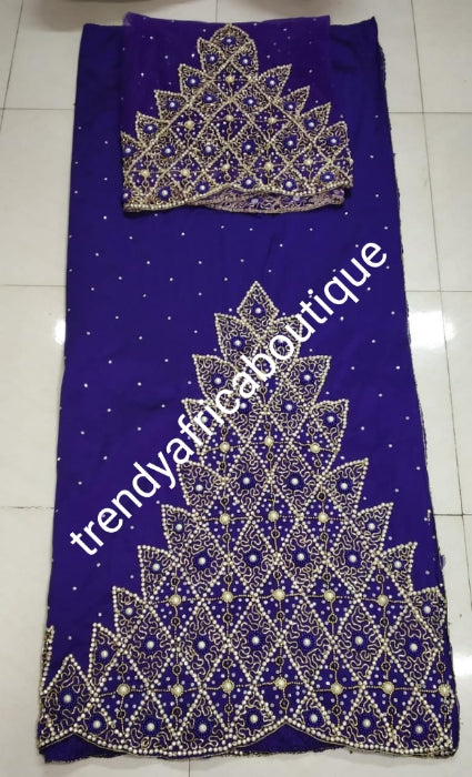 New arrival, Purple VIP/Celebrant Supper quality Silk George Wrapper for High society Ceremony. Niger/Igbo/Delta women George wrapper comes in 5yds wrapper + 1.8 yrds matching blouse. Nigerian Traditional outfit hand beaded and stoned