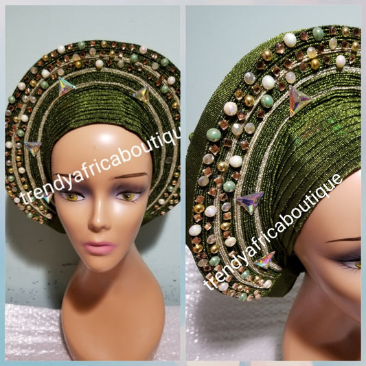 Metallic Olive green/champagne aso-oke embellished with beads auto-gele. Wahala free gele already made for you with finest quality aso-oke. Easy adjustment for proper fit at the back. Original quality from Nigeria.