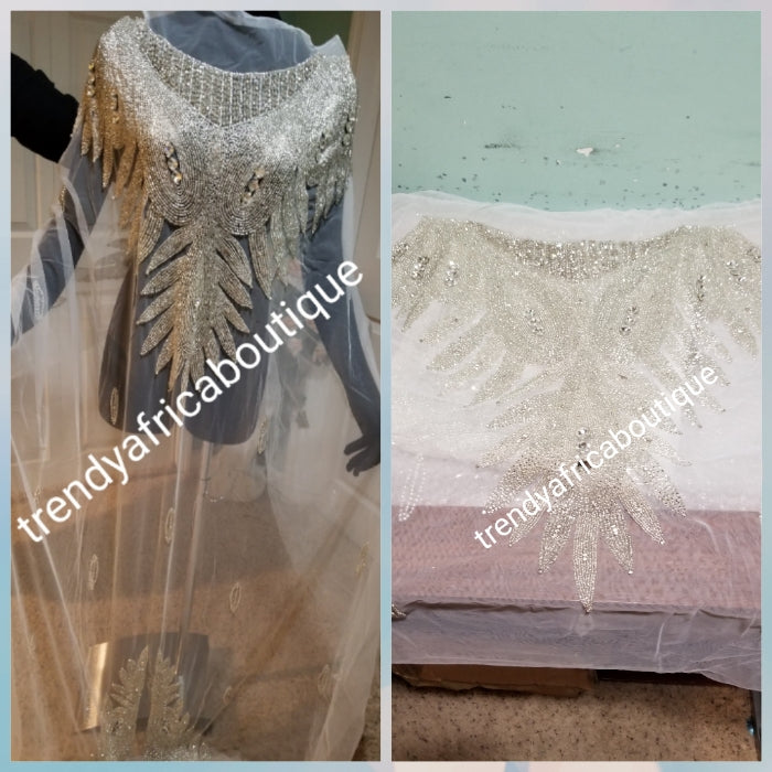 Pure white Heavily-beaded net for making modern blouses. Popularly use by Igbo/Delta/edo women for big Occasions. Comes in 1.8yds lenght already design for your beautiful blouse. 1.8yds × 55" width.