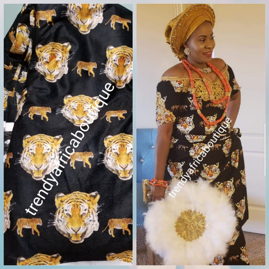 Sale; Original quality Black/Gold/white tiger head/ Isi-agu wrapper, Igbo traditional wrapper use by men or women. Sold per yard, price is for one yard. Nigerian/igbo ceremonia fabric. Soft texture, authentic isi-agu fabric. Igbo Tiger head fabric.