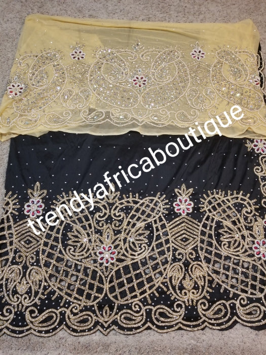 New arrival Nigerian Traditional weddings/celebrant super quality silk George wrapper. Black George + 2yds matching  design net . Feel the difference in quality. Beautiful hand cut design with beaded/Crystal stoned for that special occasion.