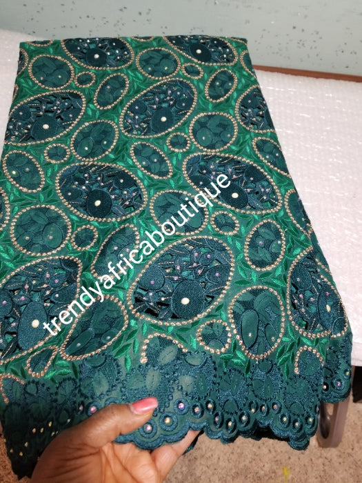 Exclusive swiss lace fabric in classic green. Nigerian traditional celebrant Swiss lace embroidered, beaded and stoned, handcut soft beautiful design. Sold per 5yds
