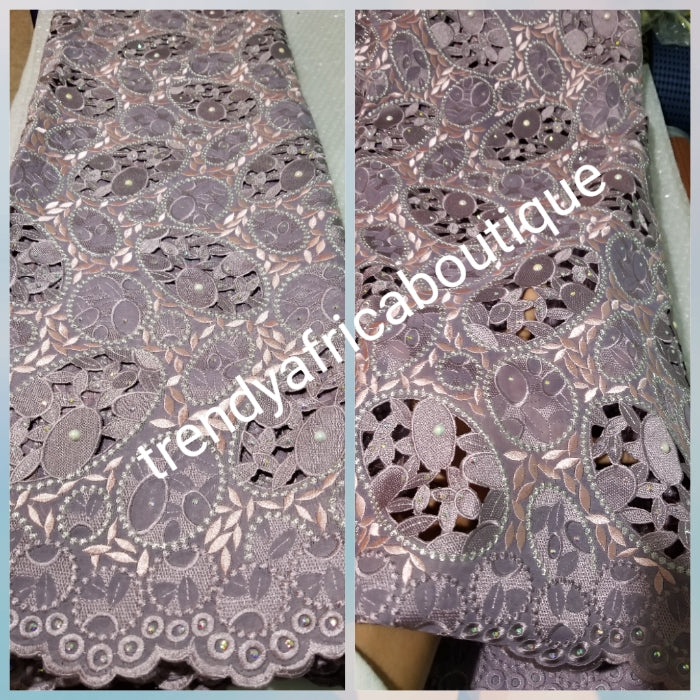 Exclusive swiss lace fabric in beautiful Onion/peach. Nigerian traditional celebrant Swiss lace embroidered, beaded and stoned, handcut soft beautiful design. Sold per 5yds