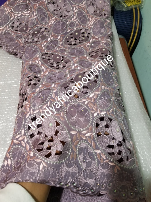 Exclusive swiss lace fabric in beautiful Onion/peach. Nigerian traditional celebrant Swiss lace embroidered, beaded and stoned, handcut soft beautiful design. Sold per 5yds