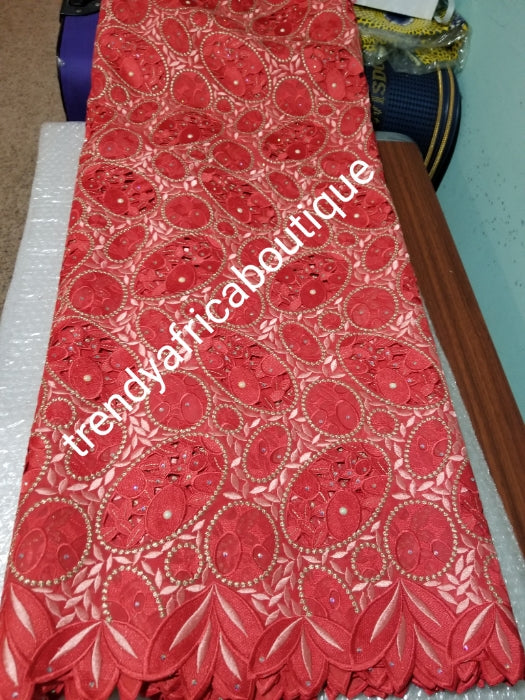 Exclusive swiss lace fabric in sweet coral/peach. Nigerian traditional celebrant Swiss lace embroidered, beaded and stoned, handcut soft beautiful design. Sold per 5yds