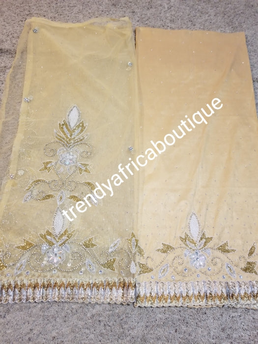 Latest skin taffeta George, champagne Gold  beaded & stoned  2.5yds + stoned Net wrapper + 2.5yds  + 1.8yds matching net blouse. Sold as a set and price is for the set. Indian-George
