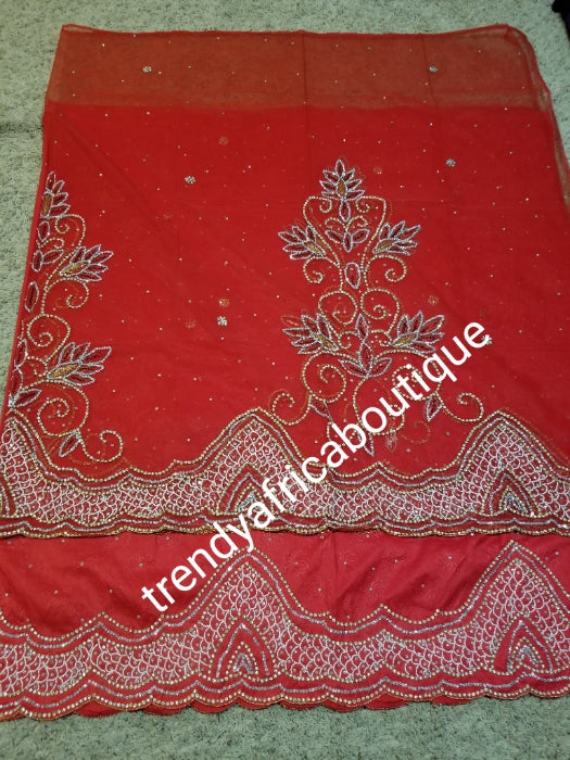 Latest Design of red skin taffeta beaded and stoned 2.5yds wrapper + 2.5yds Net wrapper + 1.8yds matching net blouse. Sold as a set and price is for the set. Soft texture, quality skin George for modern Nigerian wrapper.