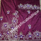 Special offer Nigerian Traditional wedding hand stoned silk George Wrapper and matching net blouse.  Purple silk George  embellished with crystal stones. Beaded and stoned on the side border as well
