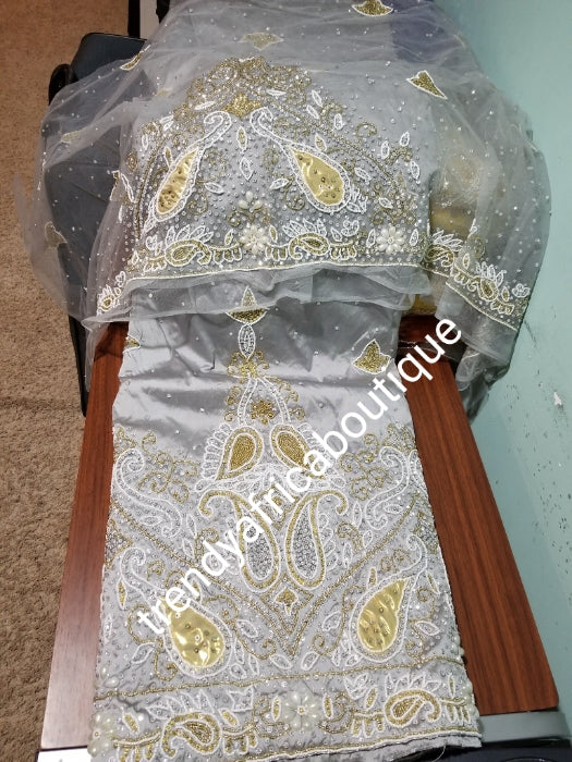Special offer, ash/Gray Heavily Beaded and hand Stoned VIP/Nigerian traditional George wrapper. Exclusive design Wrapper for Nigerian/Delta/Igbo  traditional wedding outfit. Sold as 2 wrapper + 1.8yds matching net for blouse. Quality guarantee!!!