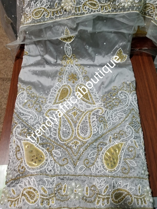 Special offer, ash/Gray Heavily Beaded and hand Stoned VIP/Nigerian traditional George wrapper. Exclusive design Wrapper for Nigerian/Delta/Igbo  traditional wedding outfit. Sold as 2 wrapper + 1.8yds matching net for blouse. Quality guarantee!!!