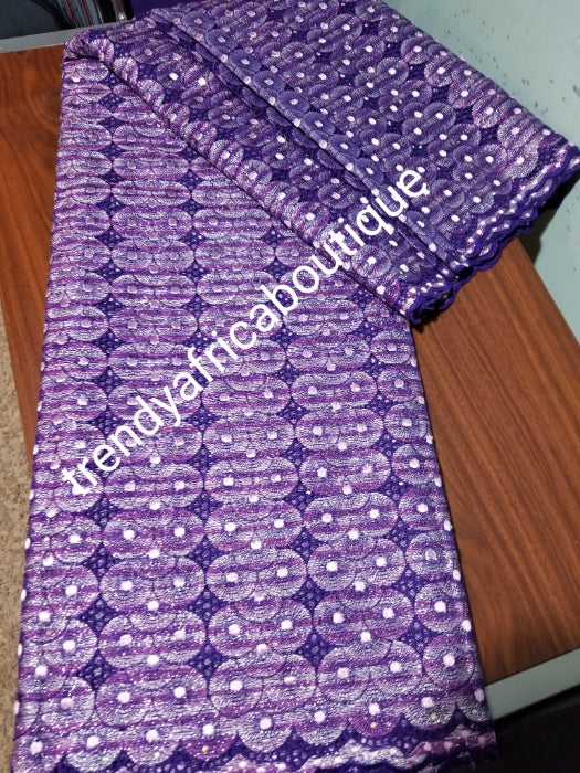 Classic embriodery purple swiss lace fabric. silver and lilac  lurex and crystal stones. Soft quality swiss lace with small holes all over. Classic design. Sold per 5yds, price is for 5yds. Ideal color for men or women Nigerian traditional outfit